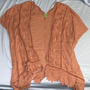 Peach colored kimono size Large.